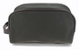 Detailansicht einer schwarzen Stofftasche mit dunkelbrauner Lederpaspelierung und seitlicher Lederschlaufe.